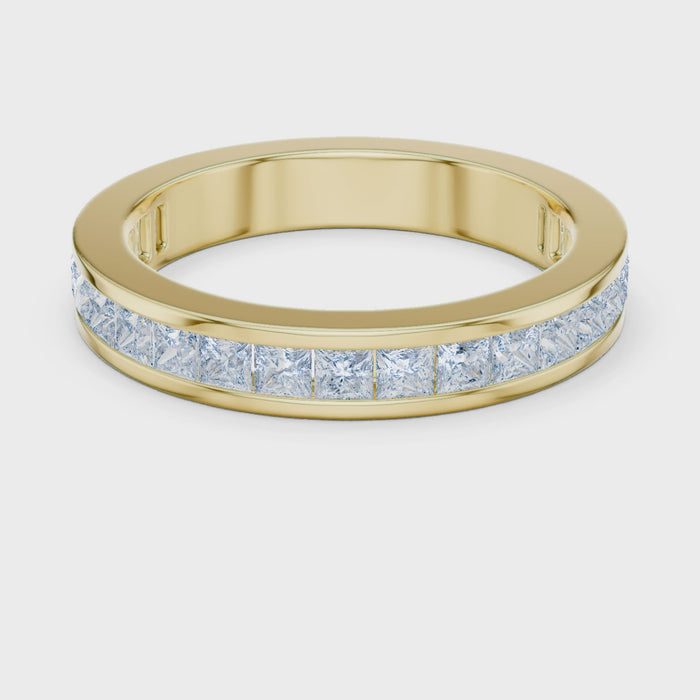 Video of yellow gold eternity band highlighting princess cut diamond setting