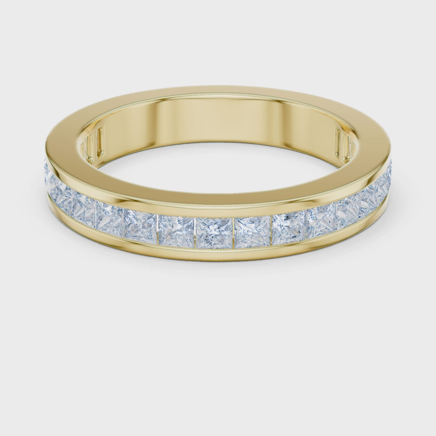 Video of yellow gold eternity band highlighting princess cut diamond setting