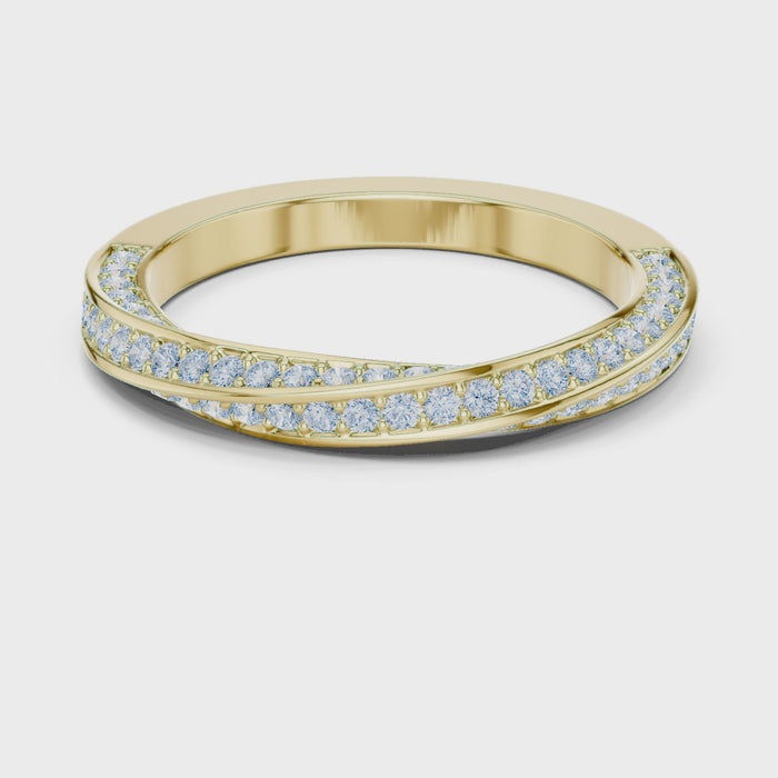 Video of yellow gold eternity band highlighting crossover twist pattern and pavé diamond setting