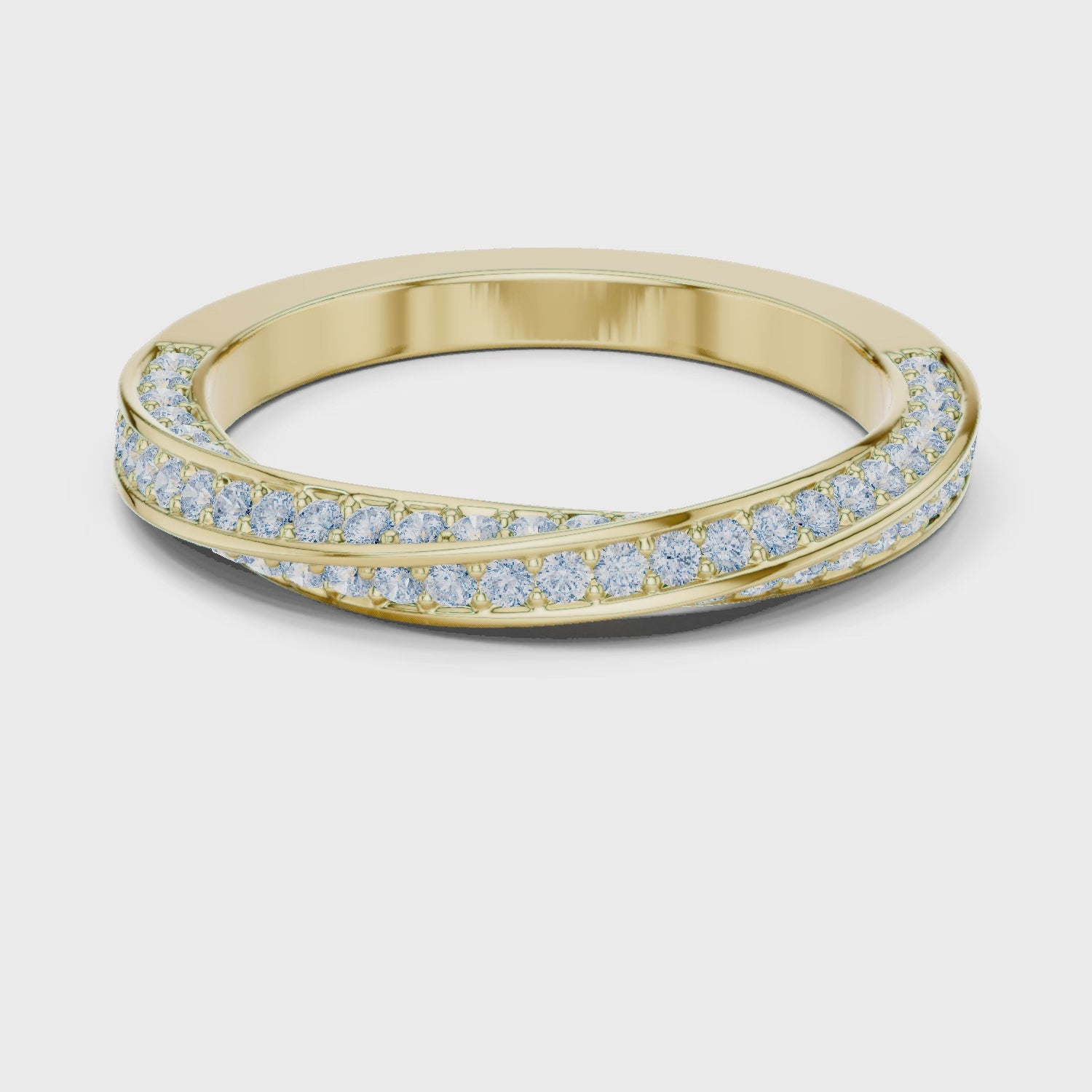 Video of yellow gold eternity band highlighting crossover twist pattern and pavé diamond setting