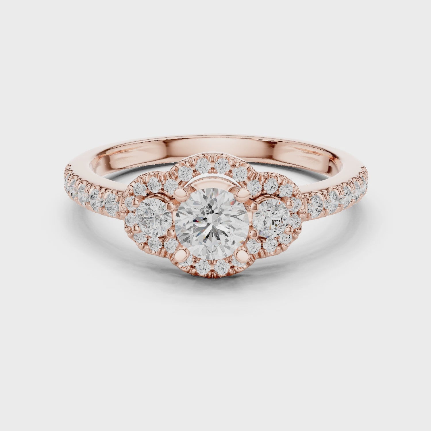 Three-Stone Diamond Halo Engagement Ring