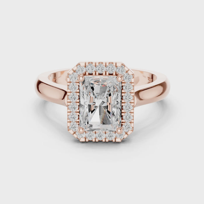 Video of rose gold radiant halo ring highlighting diamond setting and band profile