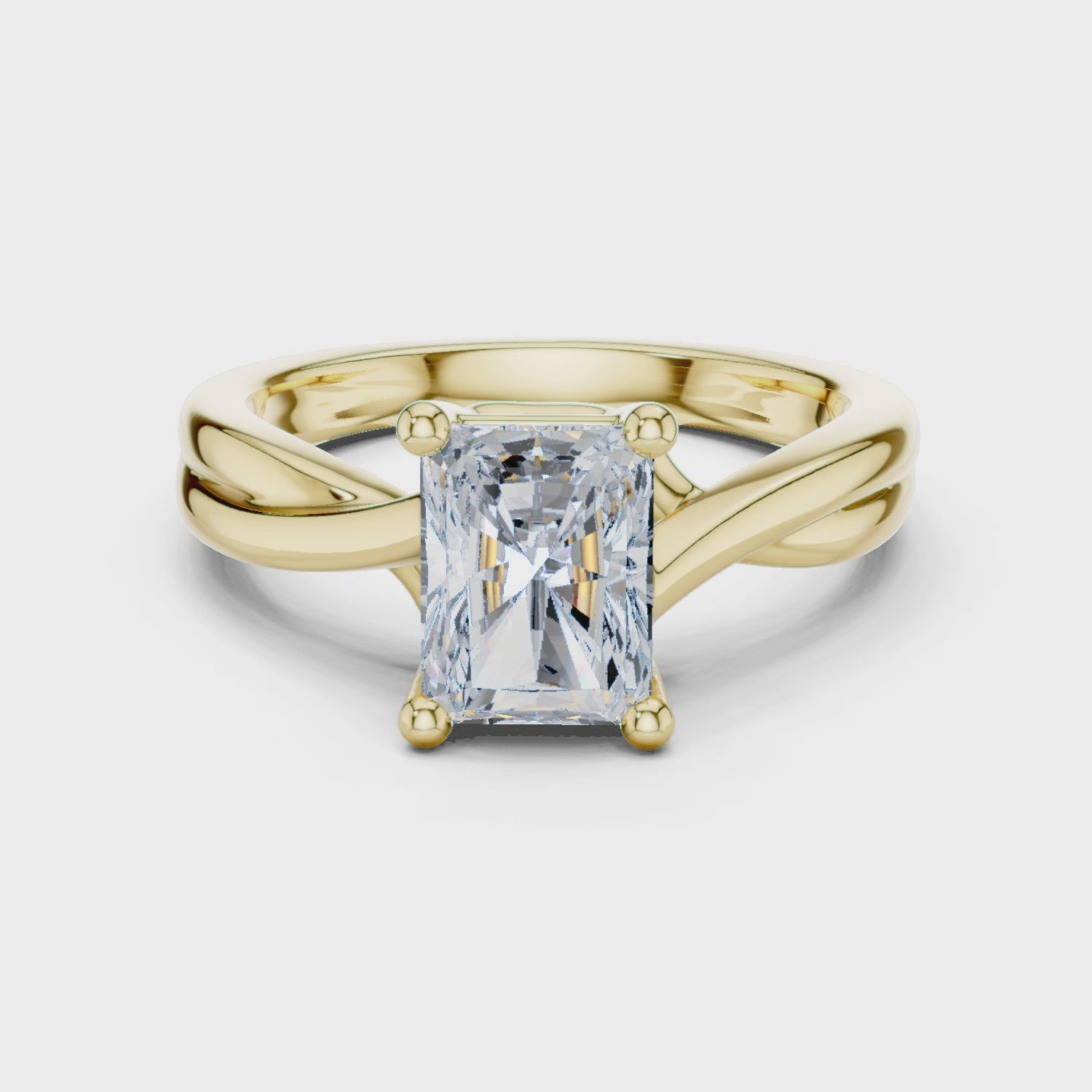 Holly Twisted Radiance Emerald Diamond Ring