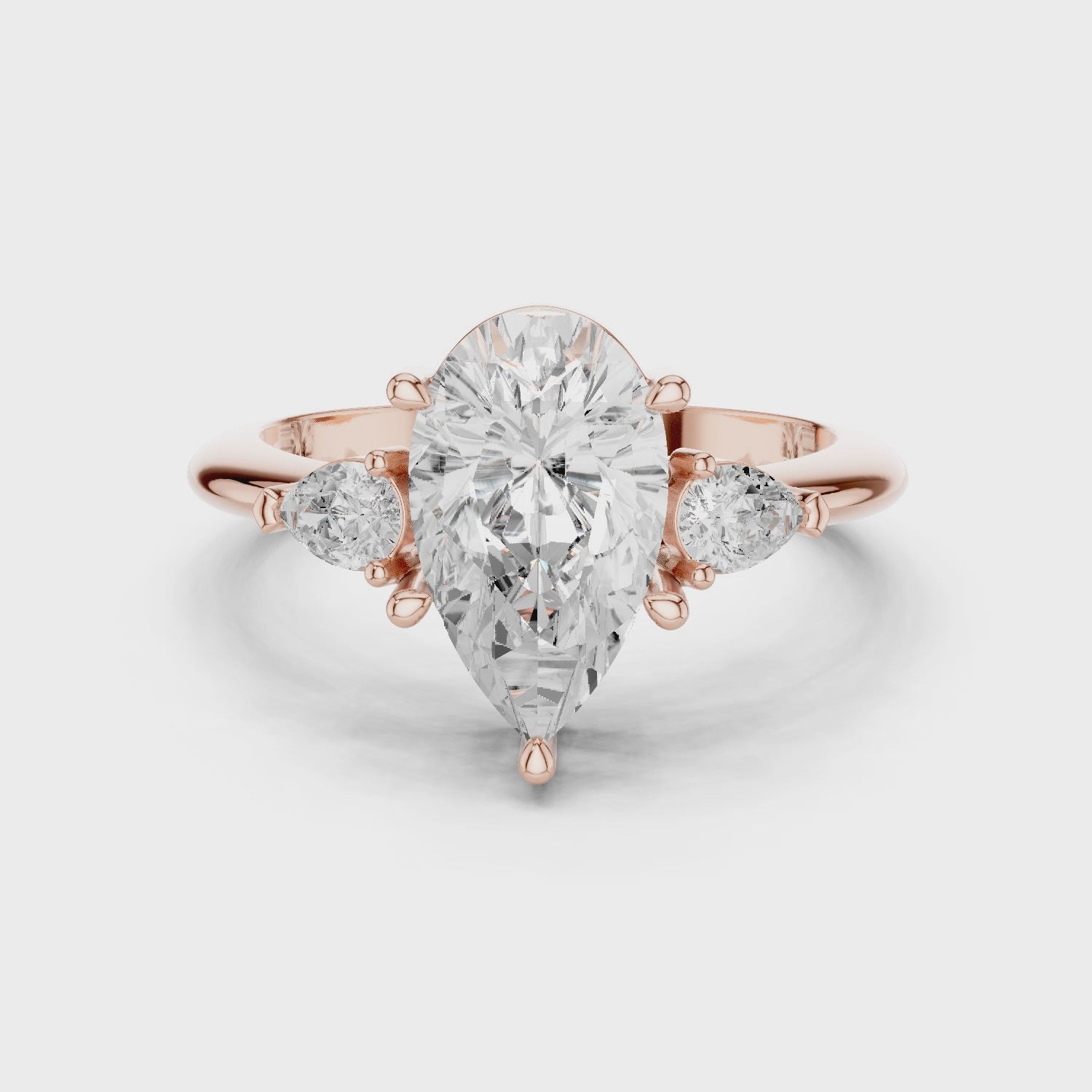 Isla Graceful Pear Diamond Three-Stone Ring