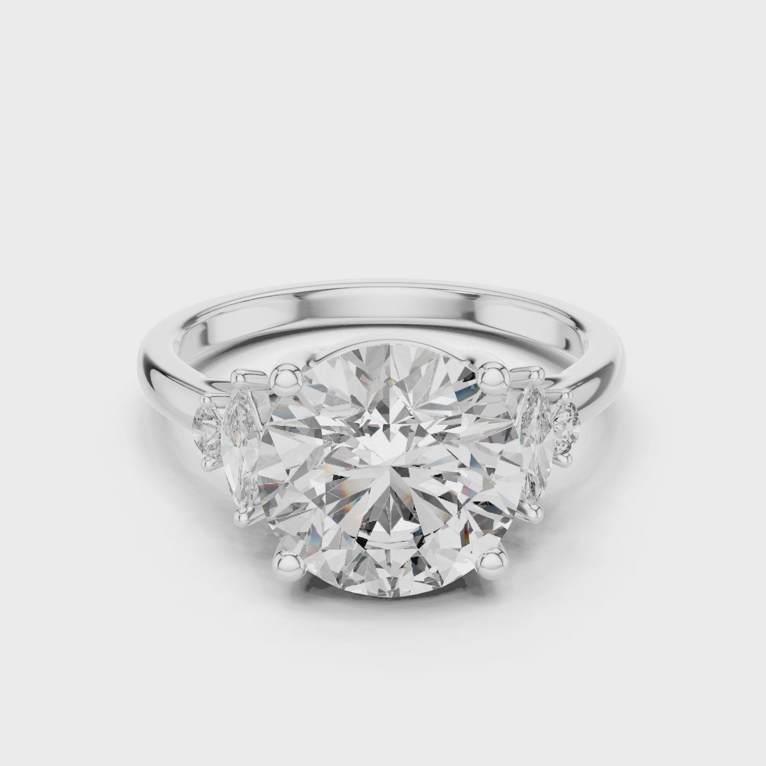 Round Solitaire Diamond Ring with Oval Side Accents