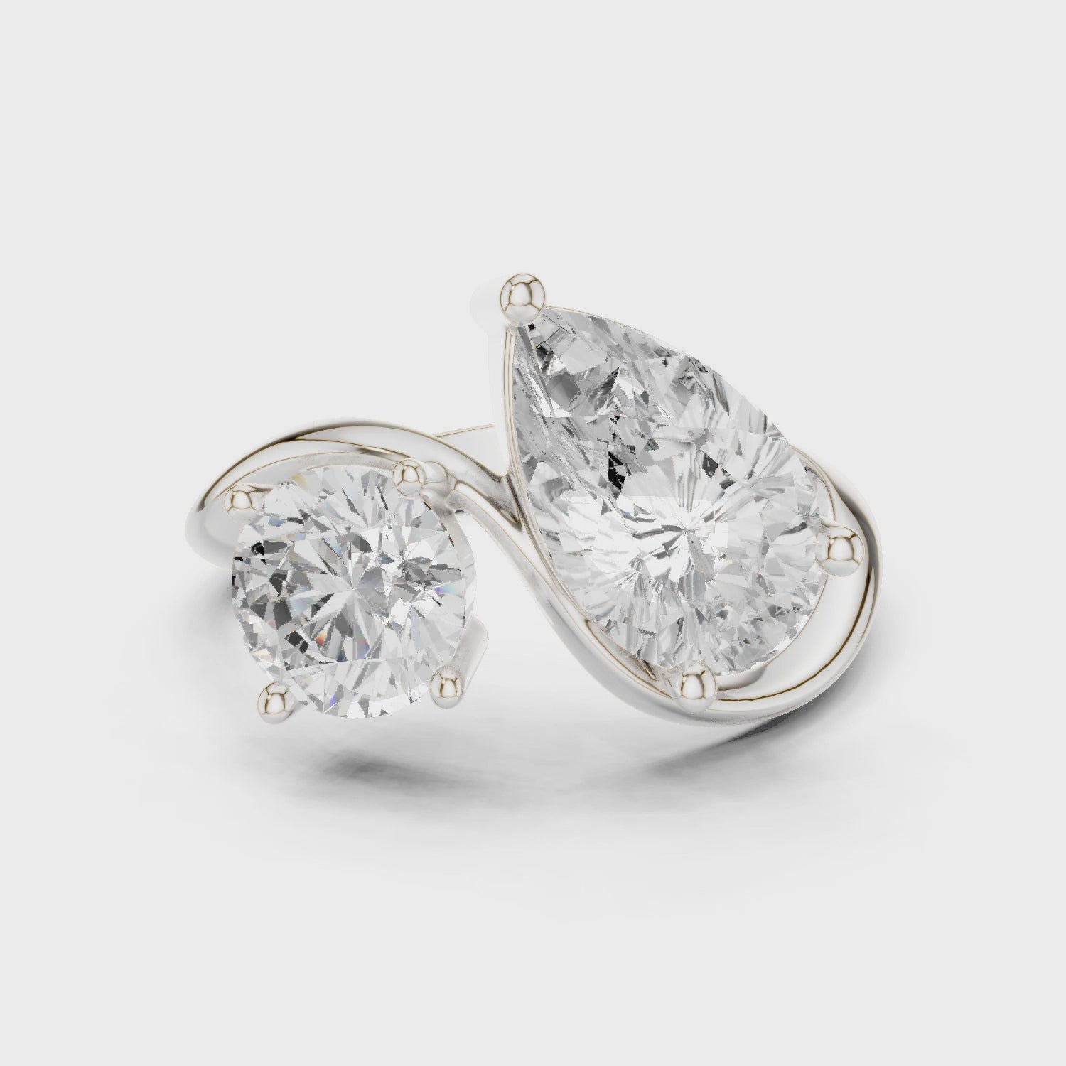 Round & Pear Diamond Bypass Ring